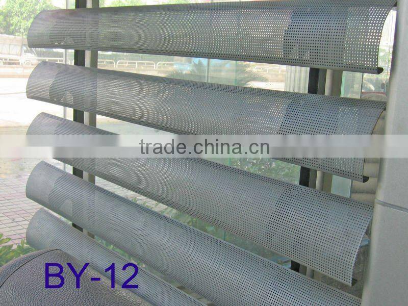 Curved perforated aluminum sun louver/screen (C E)