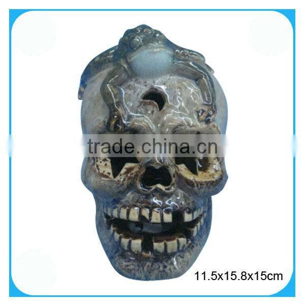 Halloween skull heads candle holder