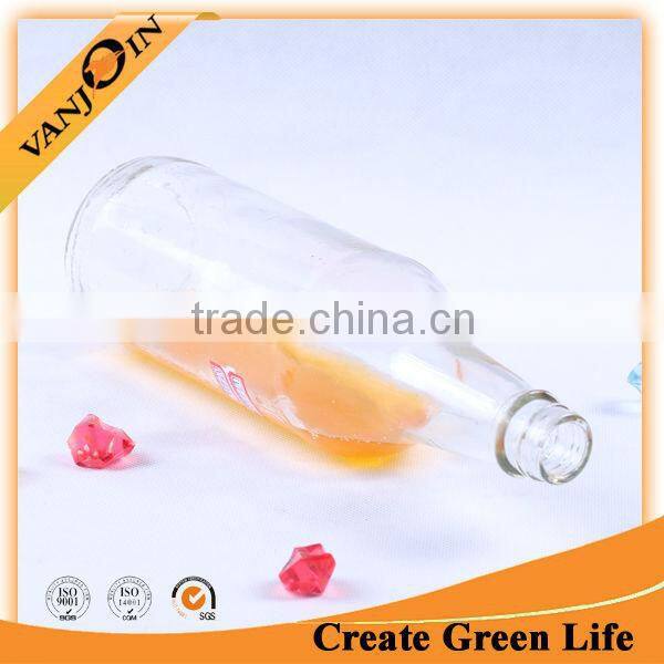 Transparent round shaped vodka glass bottle