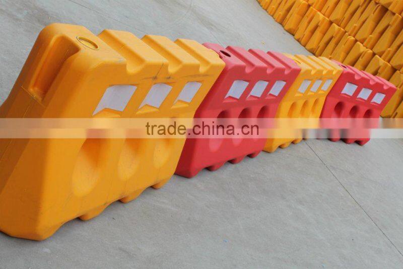 Plastic water filled road barrier three holes