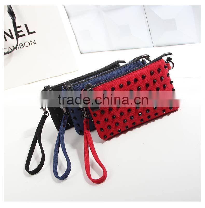 2016 Europea style factory directing selling high quality women blue clutch bag with rivet