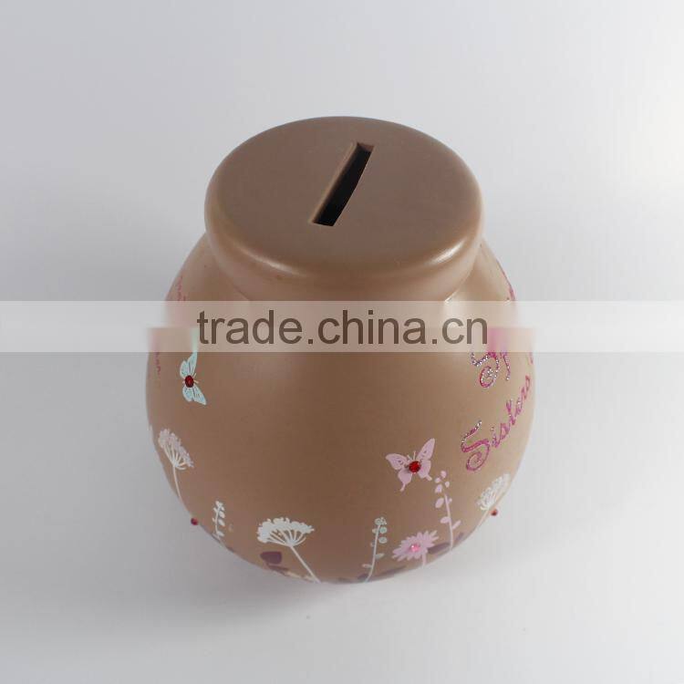 Polyresin decorative coin box