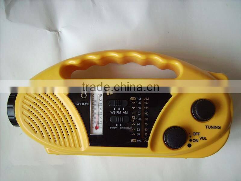 solar dynamo radio with LED torch and cell phone charger and thermometer
