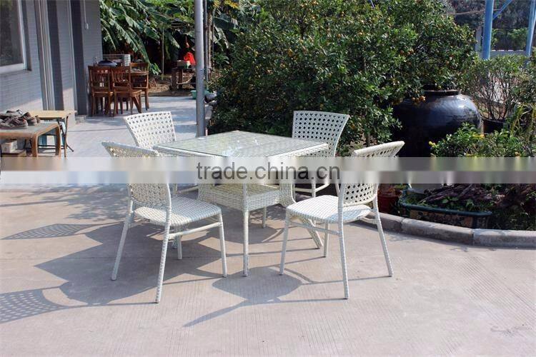 Catering venues white rattan dining table and chair