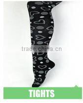 Red colored girls tight leggings with fashion flowers