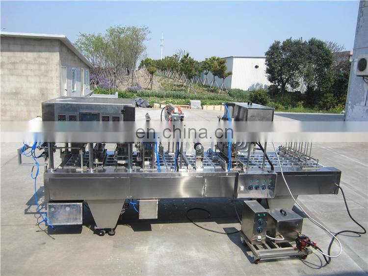 Automatic plastic cup sealing lid machine