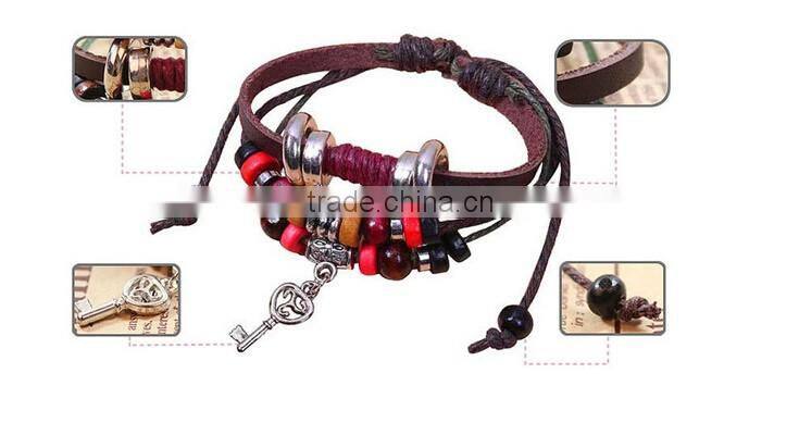 >>best selling multi layered key Charms bracelet, braided leather bracelet /