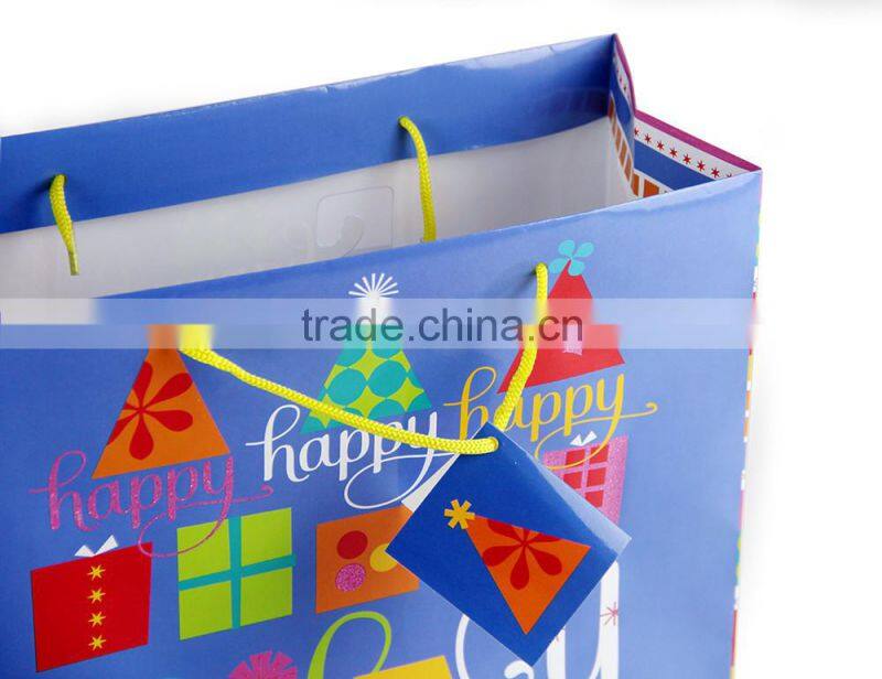 Wholesale custom folding shopping birthday paper gift bags with handles