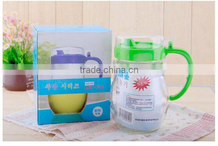 Glass oil pot with handle and lid