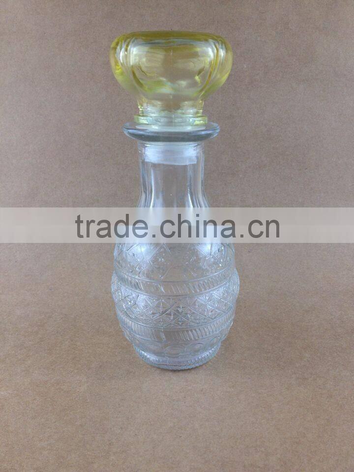 clear body yellow lid glass diffuser bottle