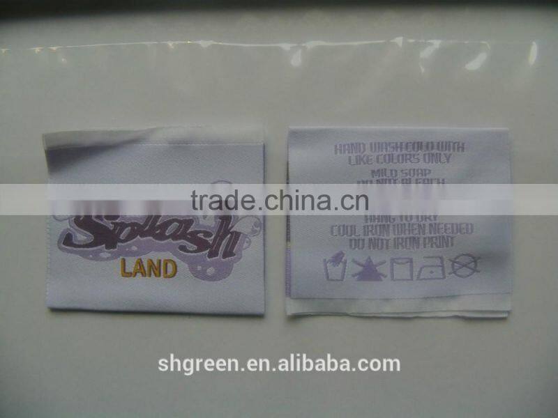 Mid-fold woven flag tag for apparel