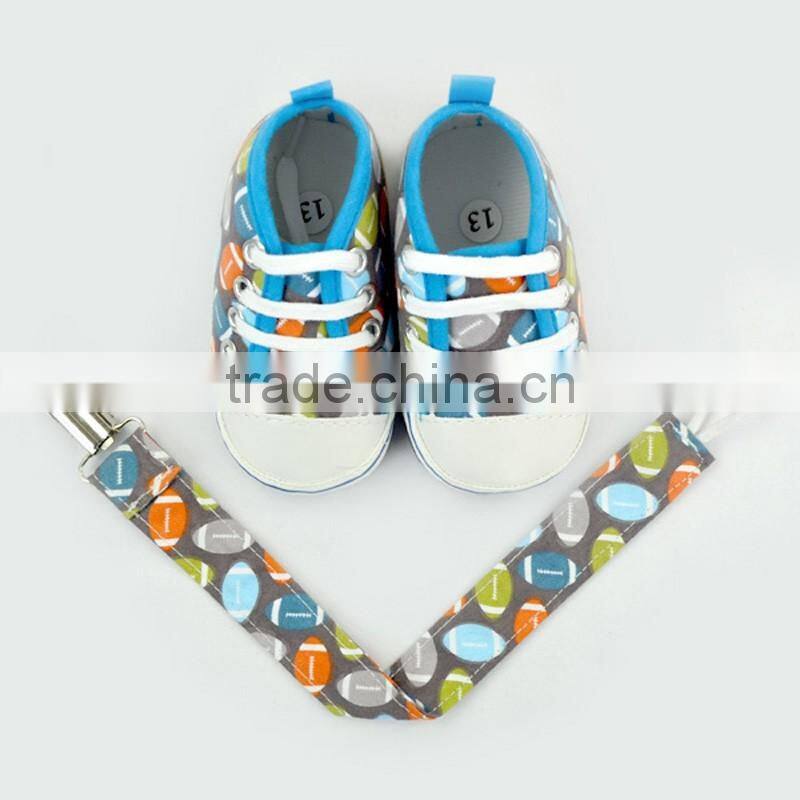Fashion Rugby Pattern High Quality Newborn Crib Shoes Baby Shoes Matching Pacifier Clip