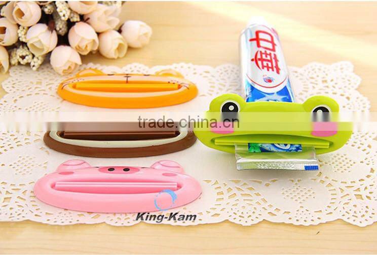 hot selling plastic toothpaste tube squeezer/toothpaste dispenser,wholesale custom children automatic toothpaste dispenser