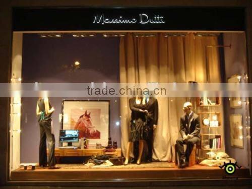 men and women clothing window fixture in the retail store
