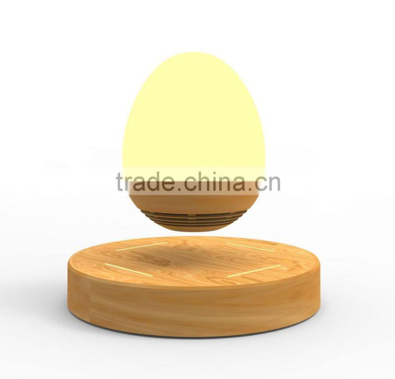 floating rotating bluetooth speaker with led light
