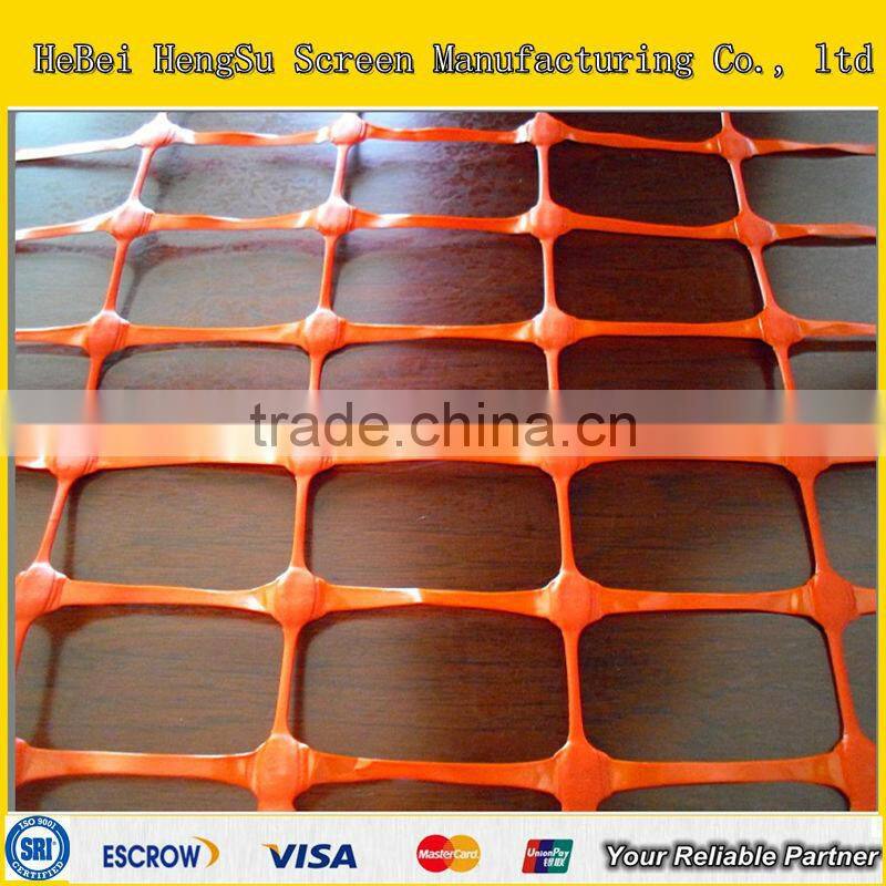 red plastic warning mesh barrier