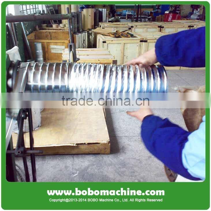 Spiral tube former machine