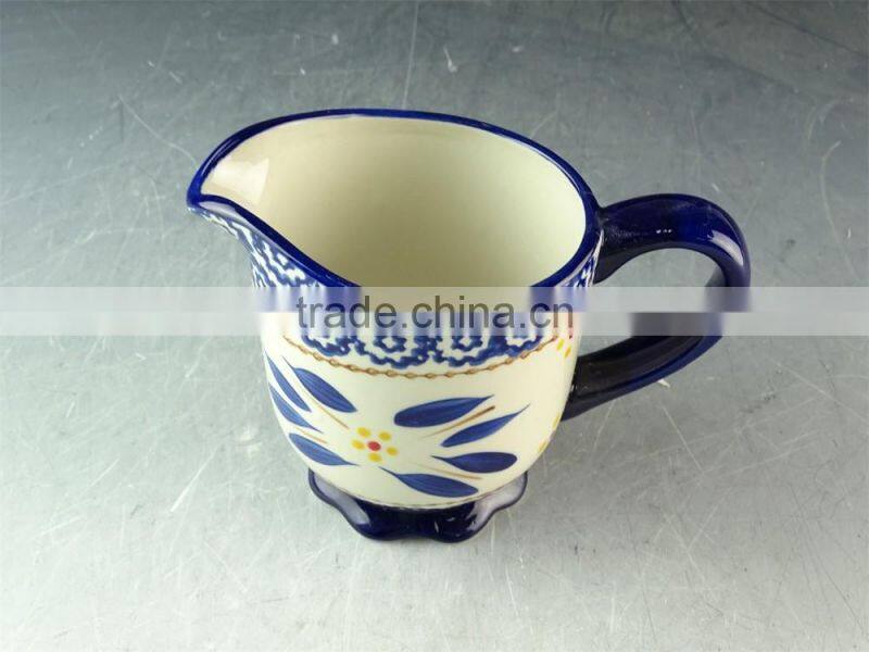 China factory unique shaped ceramic cup with handle, cheap stock porcelain cup for wholesale