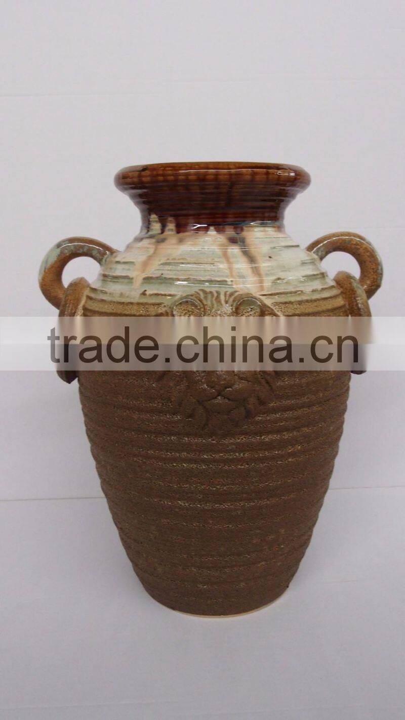 Pottery urn with antique finish