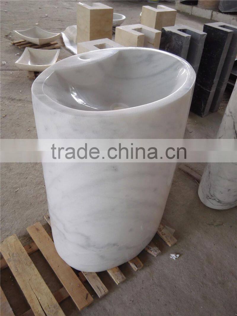 White carrara marble round kitchen pedestal sinks