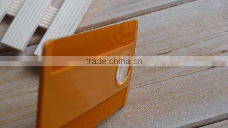 tick comb with magnifier