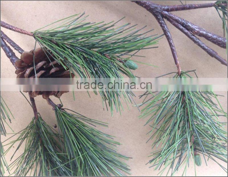 Plastic pine branch with cone