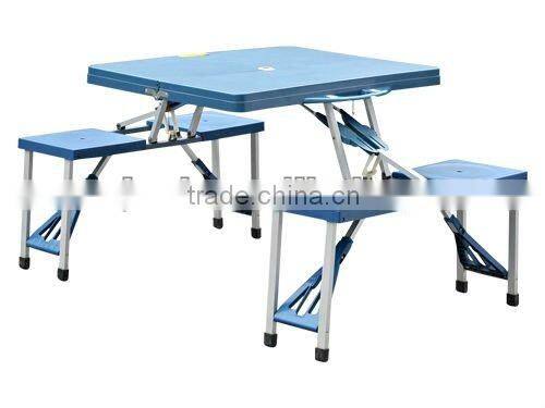 Plastic picnic table with umbrella