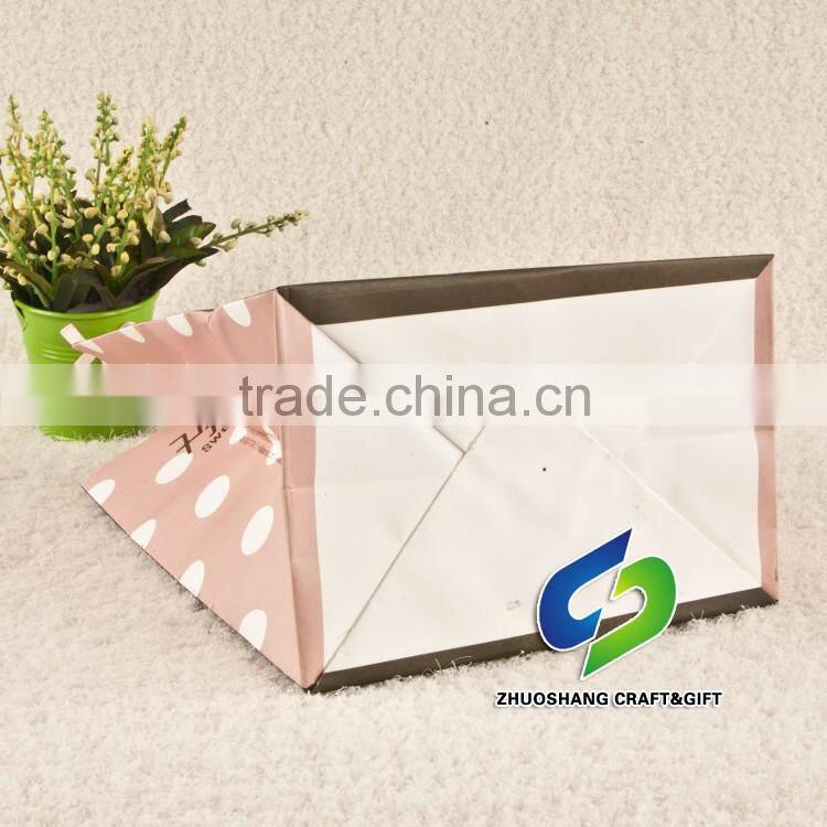 Block bottom paper bag with rope handle