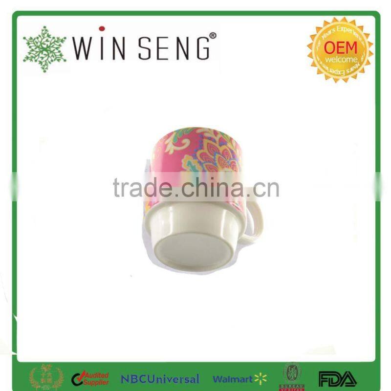 Colorful ceramic tea or coffee mug cup with ring