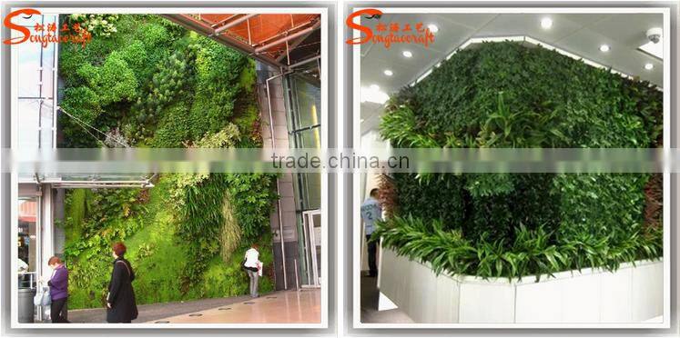 Green artificial garden plant wall