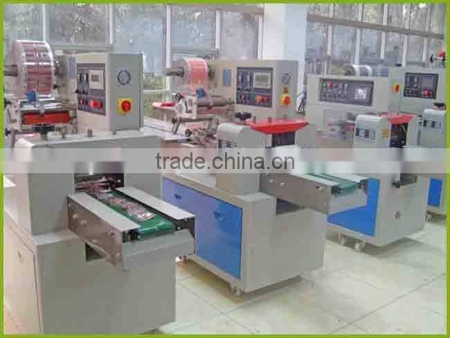 Top quality Peanut candy pillow type packing machine price