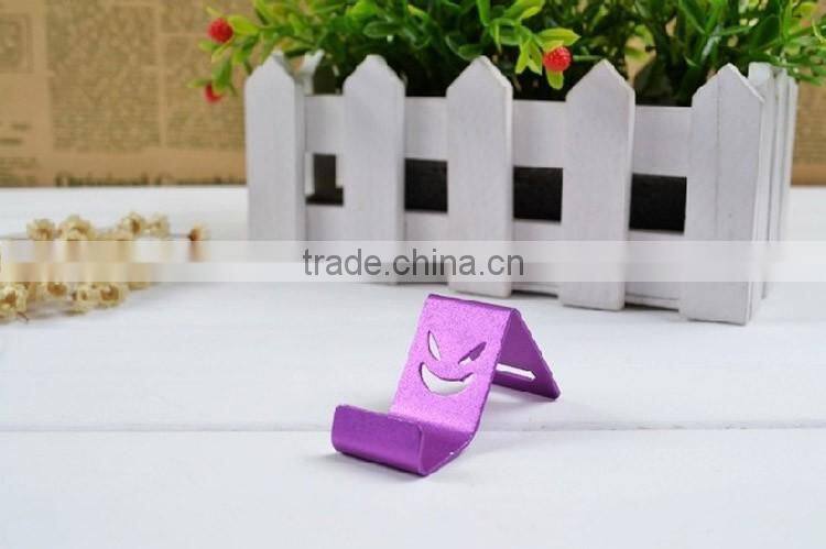 Universal Color Devil Smile Face Aluminum Metal Mini Cell Phone Holder Smartphone Hoder Phone Stand