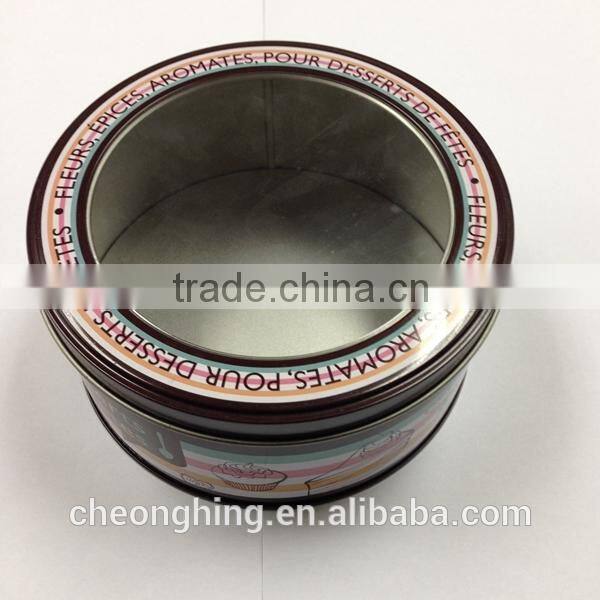 Round tin box with window