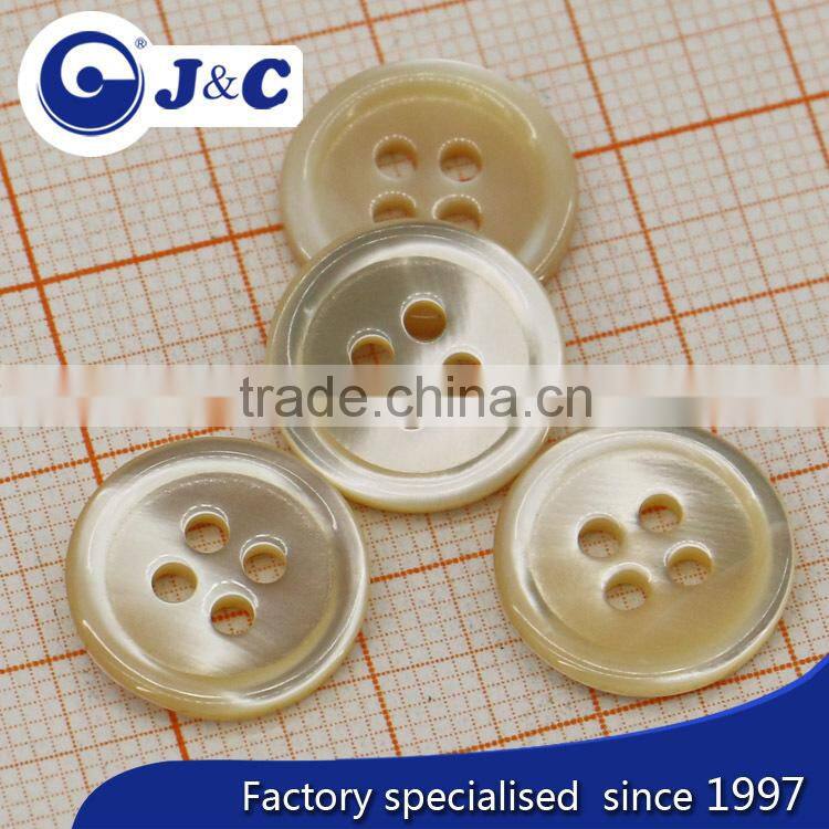 cream coloureed trocas shell button