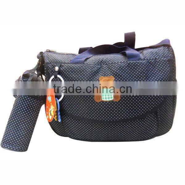 stock mummy bag/diaper bag with little doll