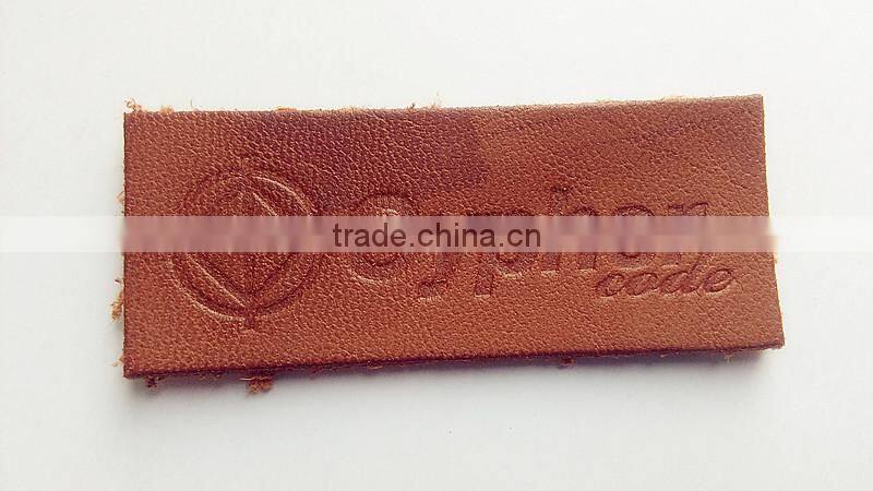 custom good quality fashion jeans pu leather label in china