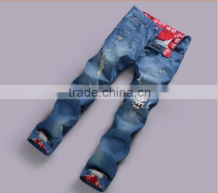 2015 Ripped Slim100% Cotton Jeans top fashion men designer jeans stock men stone washing hole blue jean trouser with opera face