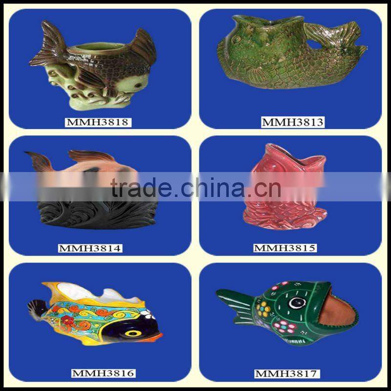 Decorative green ceramic fish planter