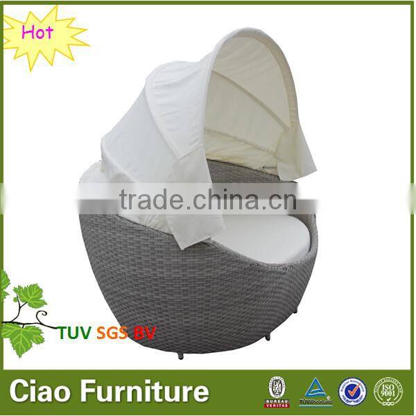 Round rattan outdoor pool bed with canopy