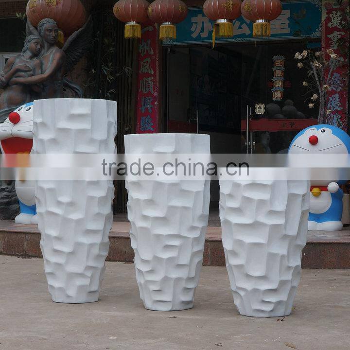 White fiberglass flowerpot