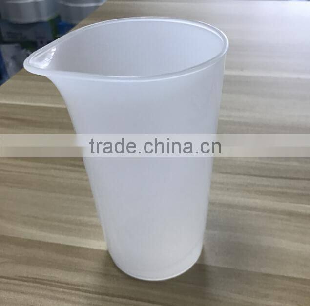 White mini household hand blender with stainless steel blades