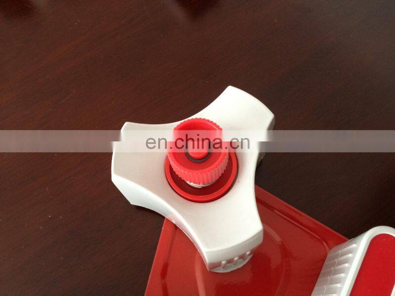 Handheld gun tape dispenser