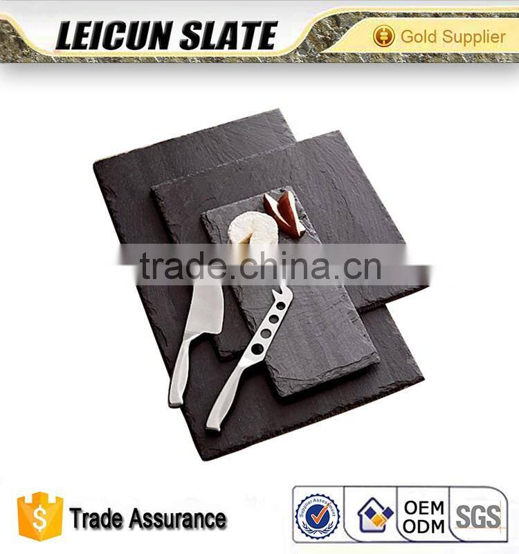Various shapes and sizes natural slate stone cheese board