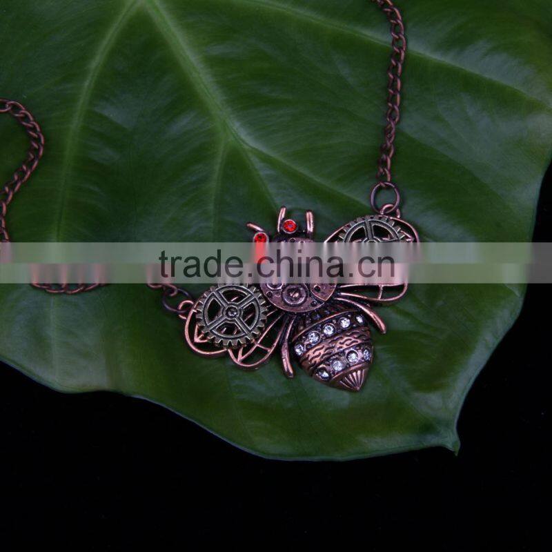 2015 yiwu fashion jewelry hot sale steampunk bee gear pendant with crystal statement necklace red copper