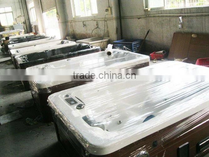 Family joyful outdoor spa/ whirlpool/hot tub with theraphy center