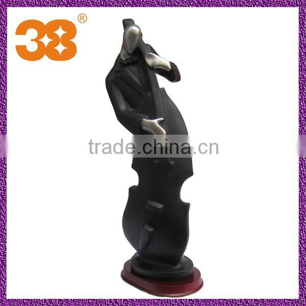 Sell black men pull cello import environmental protection resin sculpture