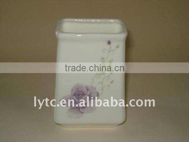 ceramic napkin holder with flower design