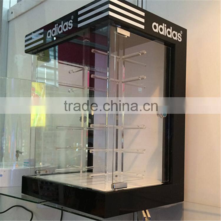 Locking sunglass display, sunglasses display with lock, fashionable sunglasses shelf display