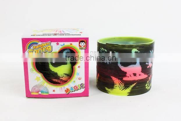 plastic magic rainbow spring toys with printed dinosaur/hot sale rainbow circle