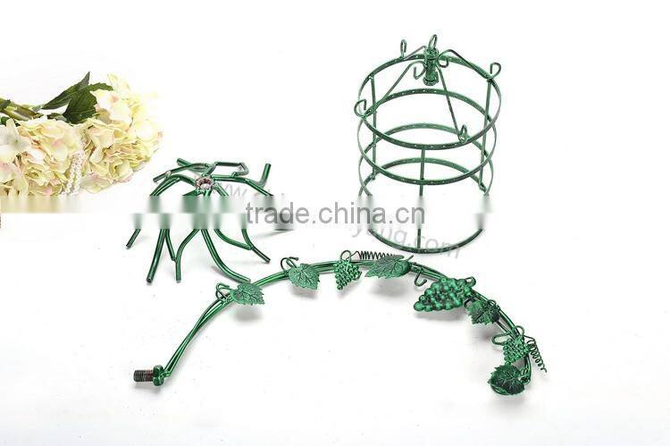 Metal display stand for jewelry with a birdcage for earrings